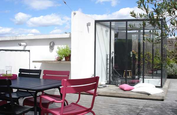 Transformation d'un toit en terrasse végétalisée style Loft par un architece paysagiste à Aix-en-Provence