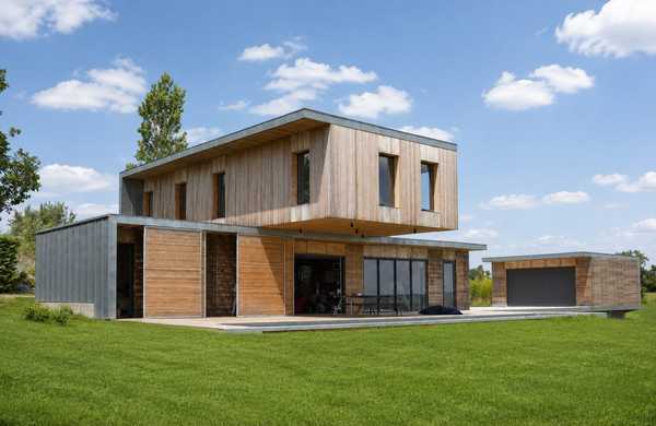 Réalisation d'une maison individuelle contemporaine avec bois et béton dans un esprit Loft par un architecte à Aix-en-Provence.