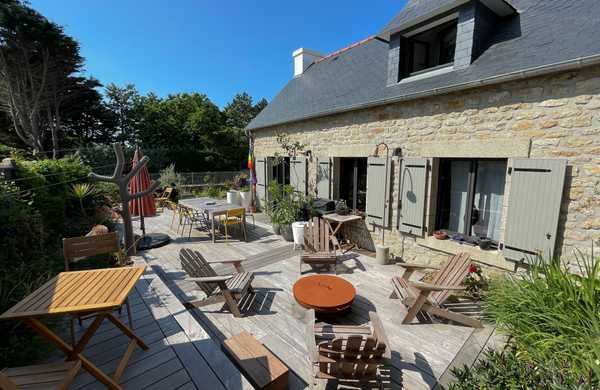 Wooden terrace for an old stone house